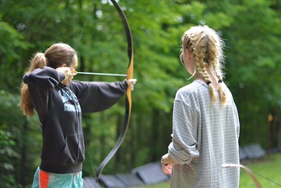 girls doing archery