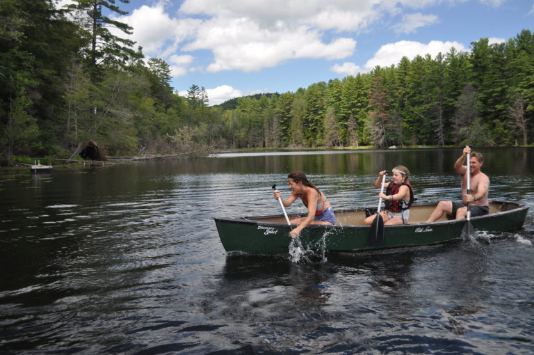 paddling in canoe