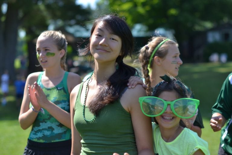 girls all dressed in green for color wars event