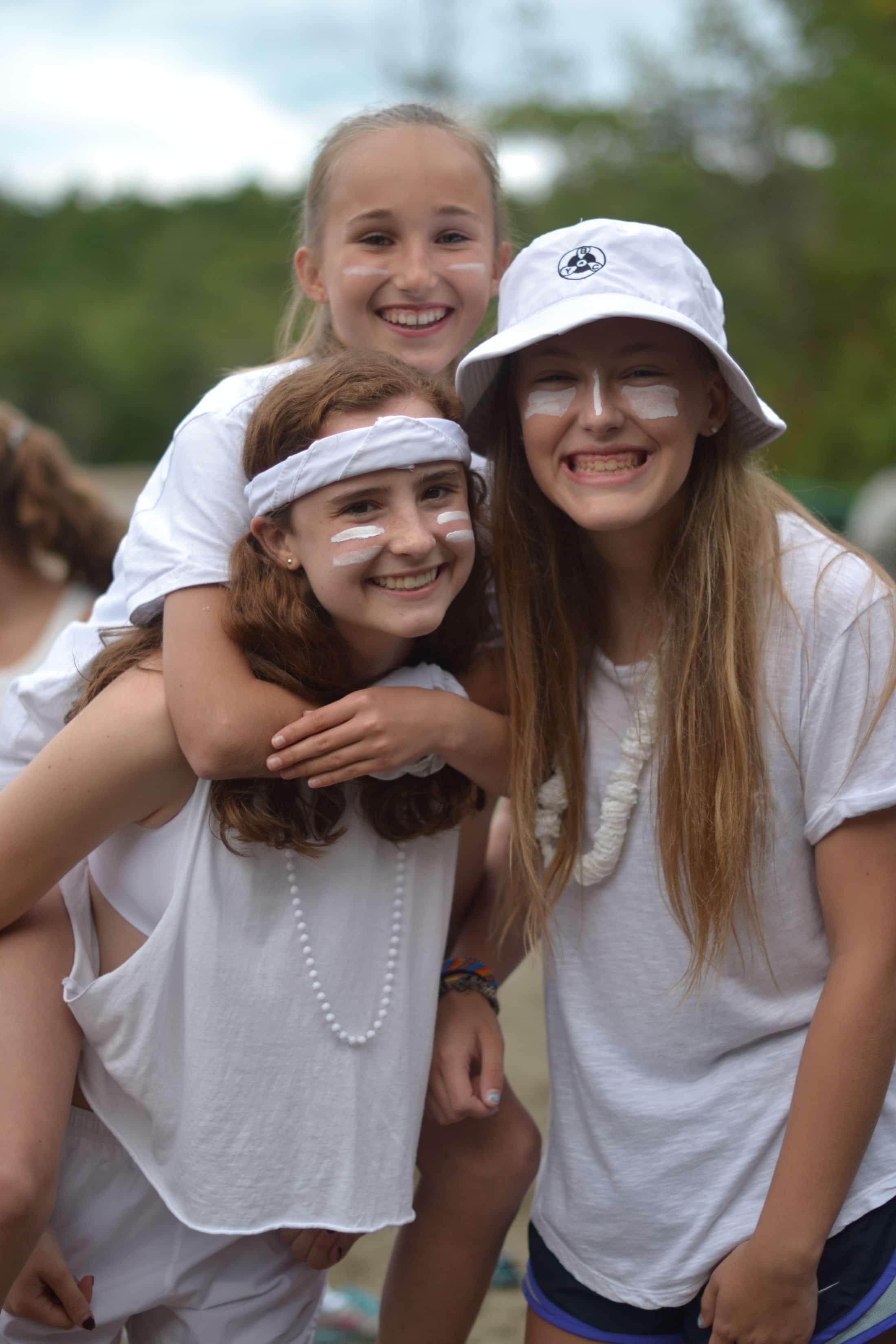 girls all dressed in white for color wars event
