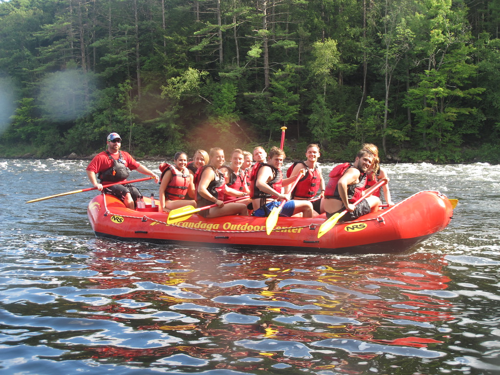 team on whitewater raft