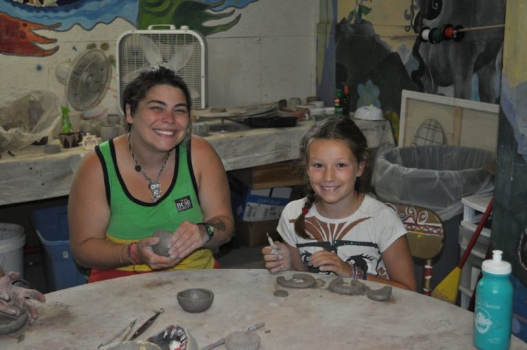 practicing pottery at summer camp