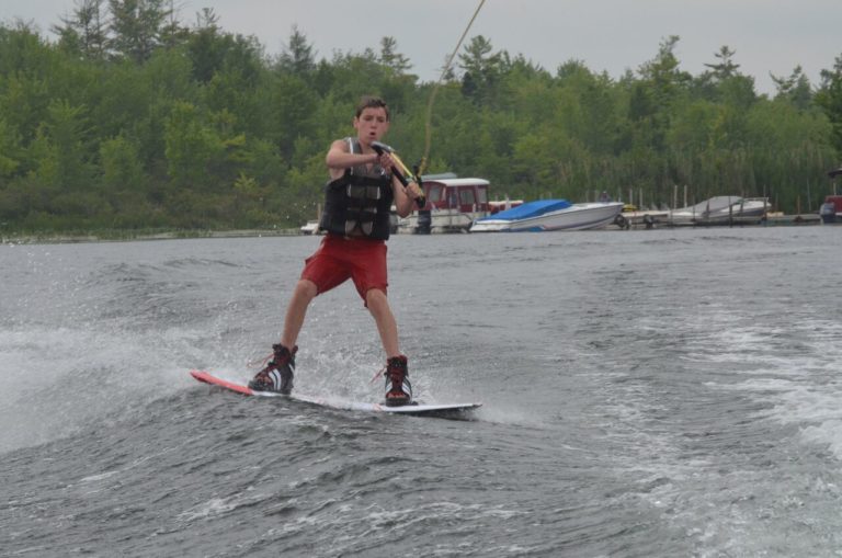Wake boarding at Forest Lake Camp
